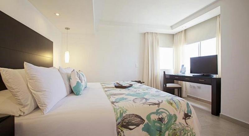 Hotel Capilla Del Mar Cartagena Rum bild A bedroom at the hotel