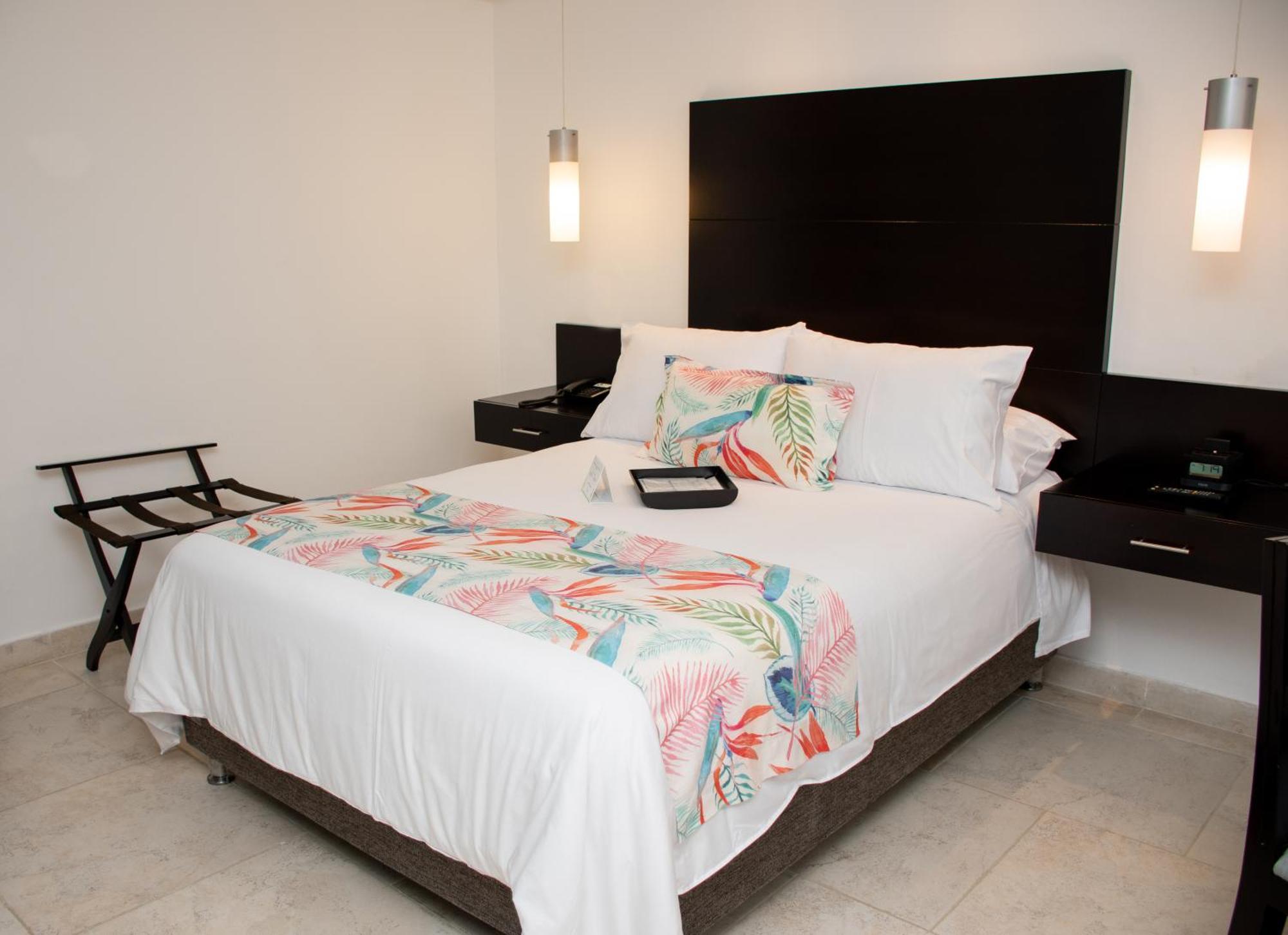 Hotel Capilla Del Mar Cartagena Exteriör bild A bedroom at the hotel